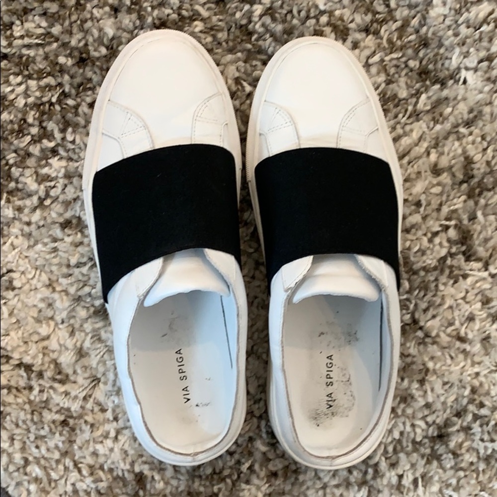 White and black slip on sneakers